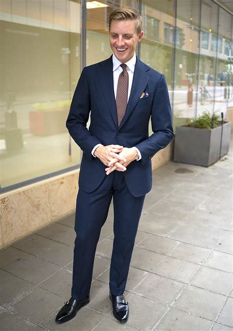 navy suit brown tie